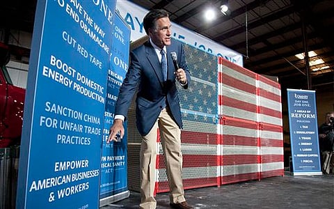 Romney cites 'job crisis' despite employment gains