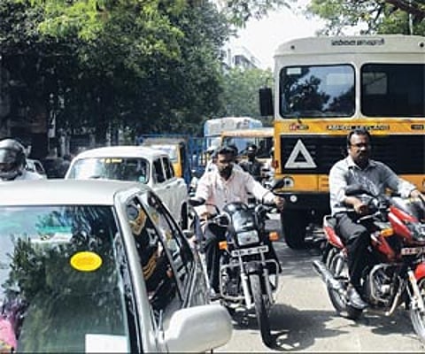 A garbage compactor disrupting traffic on College Road in Nungambakkam/Shiba Prasad Sahu.