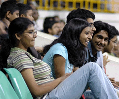 Spectators cheering for the Chennai Open match