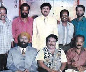 MeCartin (standing, second from right) on the sets of 'Punjabi House'