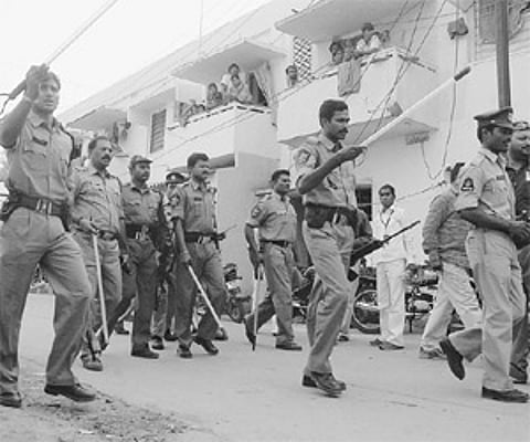 Police dispersing mobs near polling booths at Sultan Shahi in the Old City on Thursday.