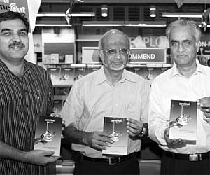 (Left to right) Manoj K Das, M D Nalappat, K Jayakumar and Sandhya Mendonca with copies of the book