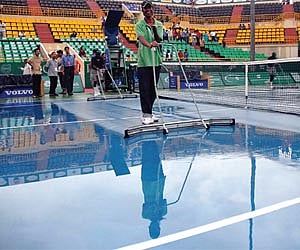 DAMPENER: Spectators show their disappointment as rain delays play on the third day of the Chennai Open at the SDAT Tennis Stadium on Wednesday.