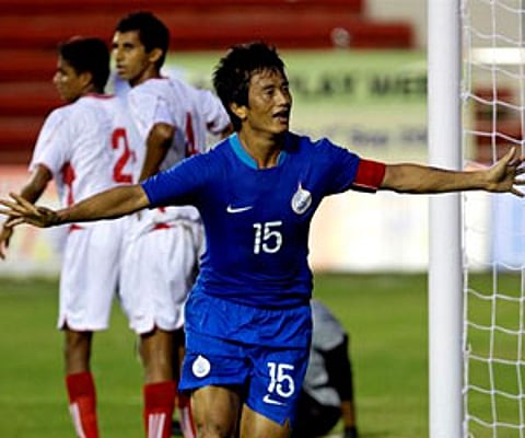 Baichung Bhutia celebrates after scoring the first goal against Sri Lanka in their Nehru Cup match in New Delhi on Wednesday. (AP)