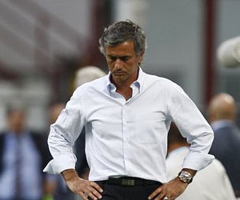 Inter Milan coach Jose' Mourinho reacts during the Italian Serie A soccer match between Inter Milan and Bari at the San Siro stadium in Milan. (AP)
