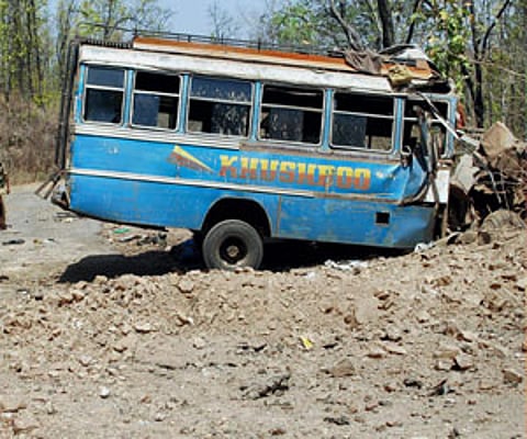 The bus that was ambushed by Maoists rebels in Lathehar, Jharkhand on Wednesday. (PTI)