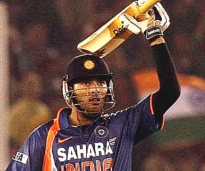 India's Yuvraj Singh reacts after completing 50 runs during the second Twenty20. (Photo: AP)