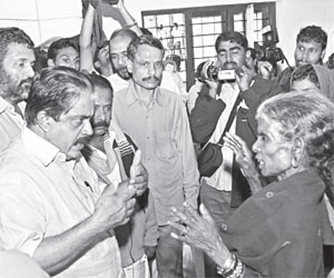 Revenue Minister K P Rajendran interacting with the inmates of the relief camp at Government L P School, Mothakkara, in Mananthavadi taluk, Wayanad