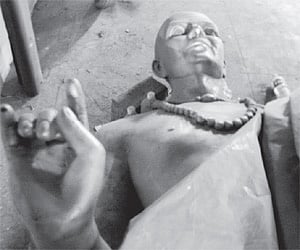 A statue of Sarvajna lying inside the Kannada Bhavan in Bangalore on Friday