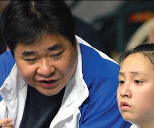 Hong Kong’s coach Tony Choi (left)