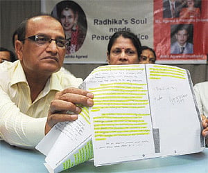 Radhika Agarwal’s father Shiv Prakash Bansal displays copies of her suicide note at a press conference on Wednesday. (Left) Shiv Prakash and Premlatha