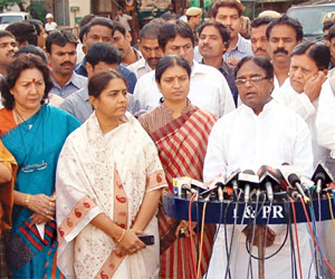 Major Irrigation Minister Ponnala Lakshmaiah addresses the media as his Cabinet colleagues from the Telangana region look on in Hyderabad on Friday.