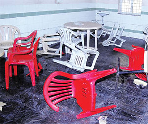 Furniture damaged by pro-Telangana agitators in the canteen of Gandhi Hospital in Hyderabad on Sunday.