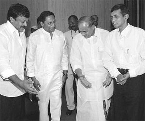 Chief Minister YS.Rajasekhara Reddy along with PRP president Chiranjeevi and LSP chief Jayaprakash Narayan escorting newlyelected Speaker N.Kiran.