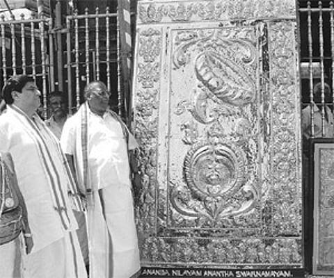 Ananda Nilayam gold covering work begins