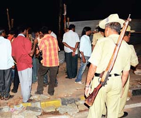 Police intervene at the site of protest at Lalbagh againt tree-felling for Metro work on Sunday.