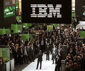 Employees follows a speech at the booth of IBM at CeBIT computer fair in Hanover. (Photo: Reuters)
