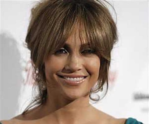Singer and actress Jennifer Lopez arrives at the Noche De Ninos benefit gala in Beverly Hills, Calif. on Saturday, May 9, 2009. (AP Photo)