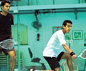 Siddharth Suchde (right) in action against Vikas Jangra in the PSA Challenger tournament in Chennai on Wednesday.