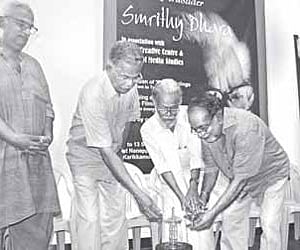 Film director K G George and artist C N Karunakaran jointly inaugurating the Smrithy Dhara, organised to mark the first death anniversary.