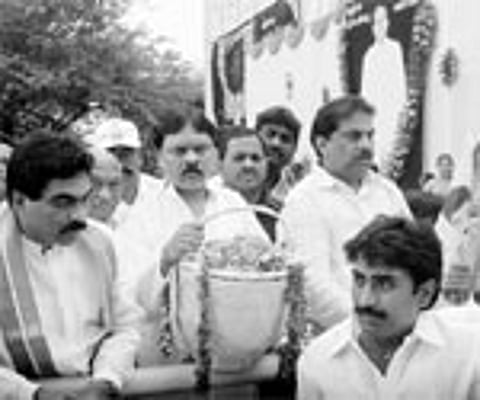 Shipping Yard Committee Chairman and son of Parvataneni Upendra, P V K Mohan (centre) going in a rally to the Krishna in Vijayawada on Sunday for imme