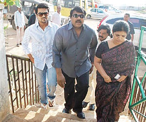 ALL IN THE FAMILY: PRP president K Chiranjeevi, son Ram Charan Tej and wife Surekha arrive at a Jubilee Hills polling booth to cast their vote.