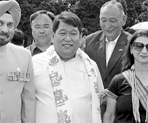 Arunachal Chief Minister Dorjee Khandu and his wife with Governor J J Singh after the swearing-in ceremony at the Raj Bhavan in Itanagar on Sunday.