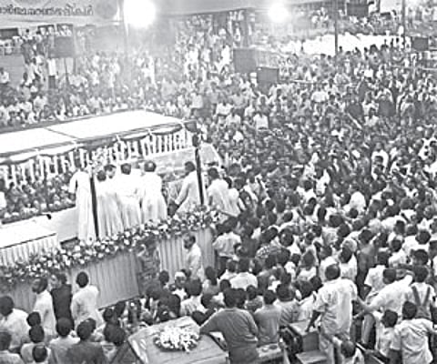 The body of Archbishop Daniel Acharuparambil being taken to a specially-prepared vehicle for a procession before the burial to be held at St Francis