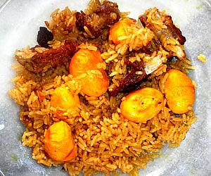 Brazilian brown rice with nuts known as pequi. (IANS File Photo)