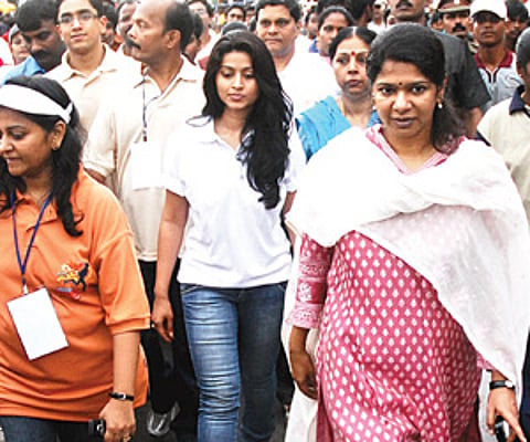 Actor Sneha and Rajya Sabha MP Kanimozhi after flagging off the Half Marathon. ENS