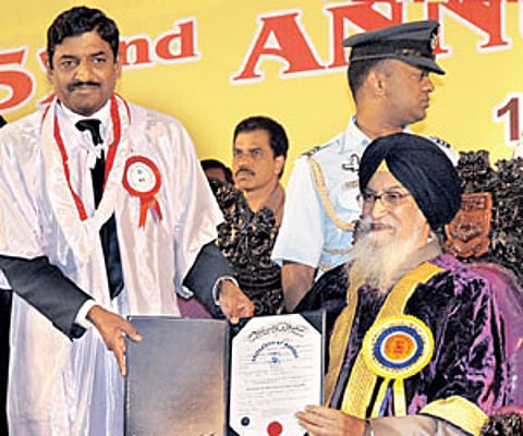 ADGP (L&O) K Radhakrishnan (second from left) receives his PhD from Governor Surjit Singh Barnala at the Madras University convocation in the city on
