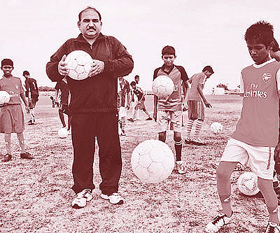 MLA Jayanarayan Mishra with wards of the Sambalpur Football Academy.