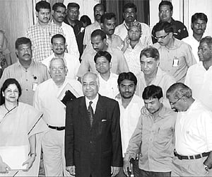 NSUI activists of Osmania University with the members of the Srikrishna Committee at Jubilee hall in Hyderabad on Monday