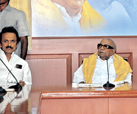 BRAINSTORMING: Chief Minister M Karunanidhi (C) and Deputy Chief Minister M K Stalin (L) at a high-level meeting of the DMK, in the city, on Sunday