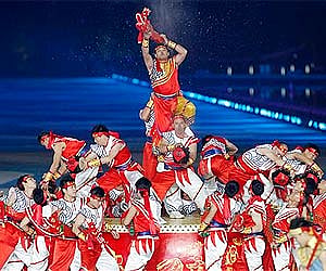 Artists perform during the closing ceremony of the 16th Asian Games in Guangzhou, China. AP