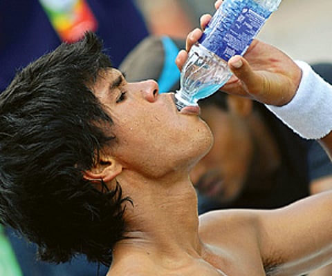 Somdev relaxes after a training session on Sunday.
