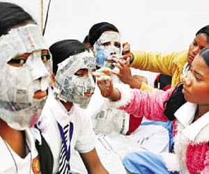 Tribal kids participating in a paper craft workshop at the Sargi Fula- 2011 Festival in Bhubaneswar on Monday. I Express