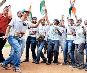 Clockwise from left: Supporters of Anna Hazare celebrating on Sheshadri Road in Bangalore on Sunday; Hazare supporters upbeat at Freedom Park; An Anna