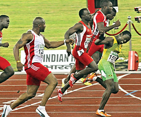 Clarke wins men's 100m