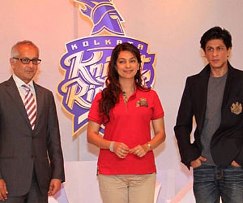 Kolkota Knight Riders owners Jay Mehta Juhi Chawla and Shahrukh Khan at the unveiling of new logo and their new marketing campaign in Mumbai | PTI