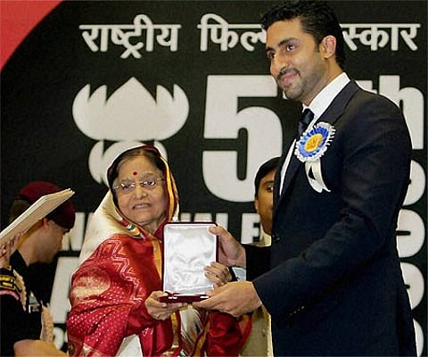 Sporting a black suit, Abhishek, 34, received the award from President Pratibha Patil. PTI Photo