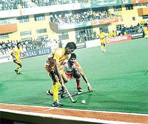 (Above) A recent World Series Hockey match (Top) Pankaj Advani and Prakash Padukone | Nagesh P