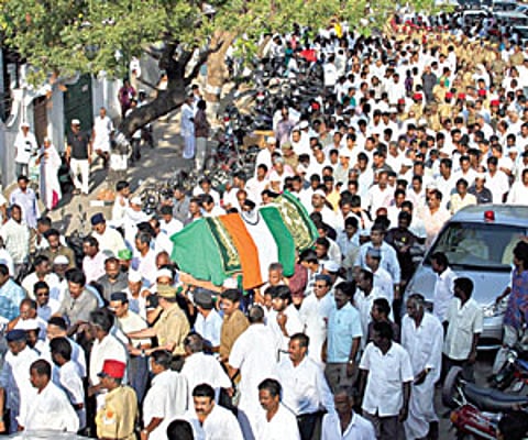 Legend passes: Leaders and public participating in the funeral procession, in Puducherry on Friday.