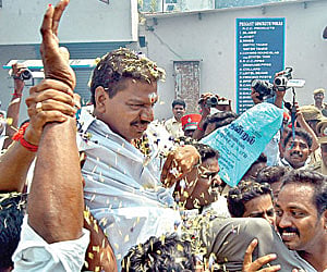 A NEW FACE: Party cadre celebrating with AINRC candidate A Tamilselvan, who won the Indira Nagar bypolls | Express Photo
