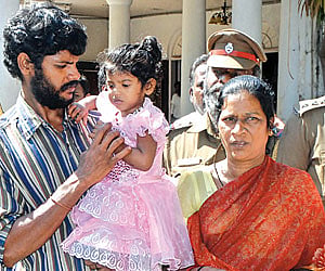 happy reunion: Priyadarshini with her father Rajesh outside the Police Commissionerate | A Raja Chidambaram