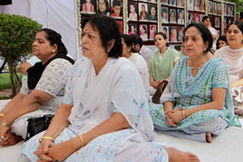 A prayer meeting on the 10th anniversary of Uphaar tragedy (File photo / PTI)