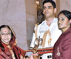 A file picture of Tejeswini receiving the Arjuna award from the President.