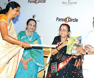 Nalina Ramalakshmi (left), editor, Parent Circle magazine, presents a copy of the fi rst issue to Dr YG Parthasarathy| Express Photo by P Jawahar.
