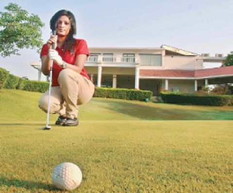 A beginner preparing to tee off. Photo: Shamim Qureshy