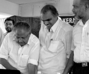 Electricity Minister Aryadan Mohammed launching the e-payment facility at the KSEB HQ in Thiruvananthapuram on Wednesday. KSEB member B Babu Prasad a